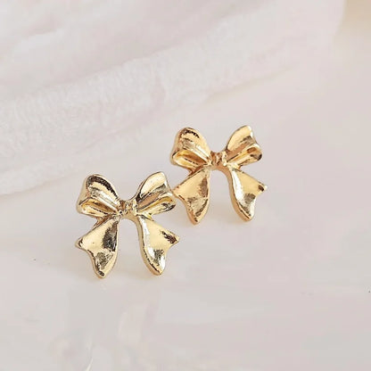 Elara Jewelry™ Delicate Gold Bow Stud Earrings