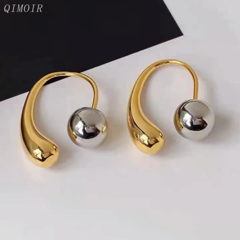 Elara Jewelry™ Modern Orb Curve Ear Cuff